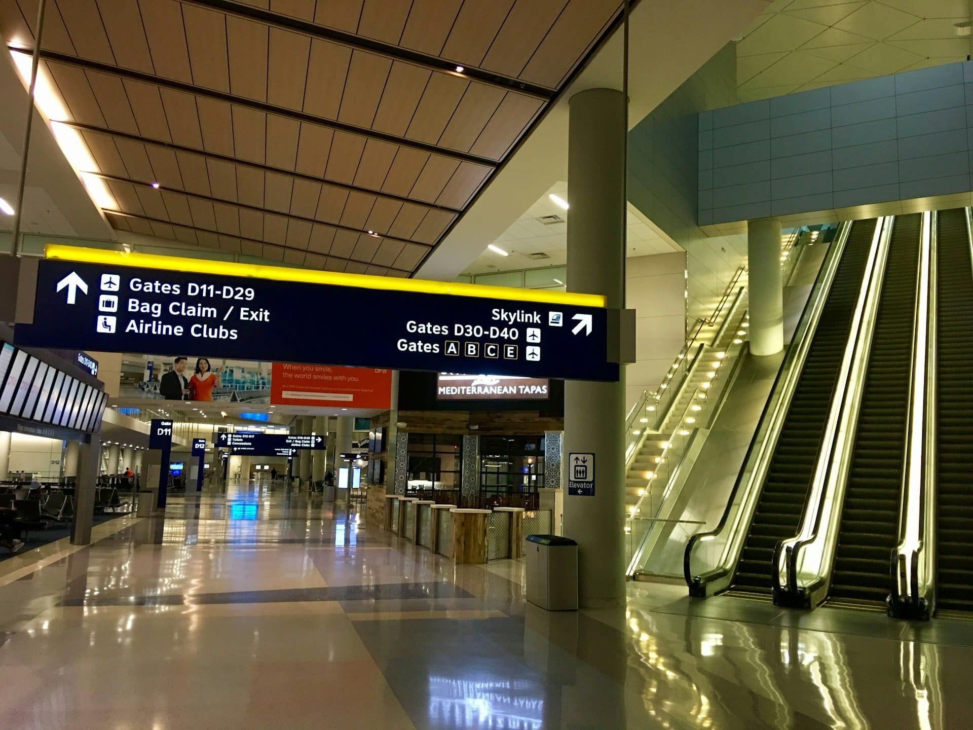 Modern airport terminal interior with sweeping architecture and natural light